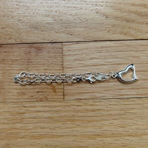 Never worn Silver Bracelet with Heart Charm